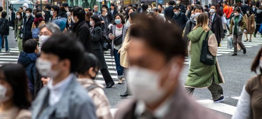 © ADB/Richard Atrero de Guzman People wear protective masks in Tokyo, Japan.